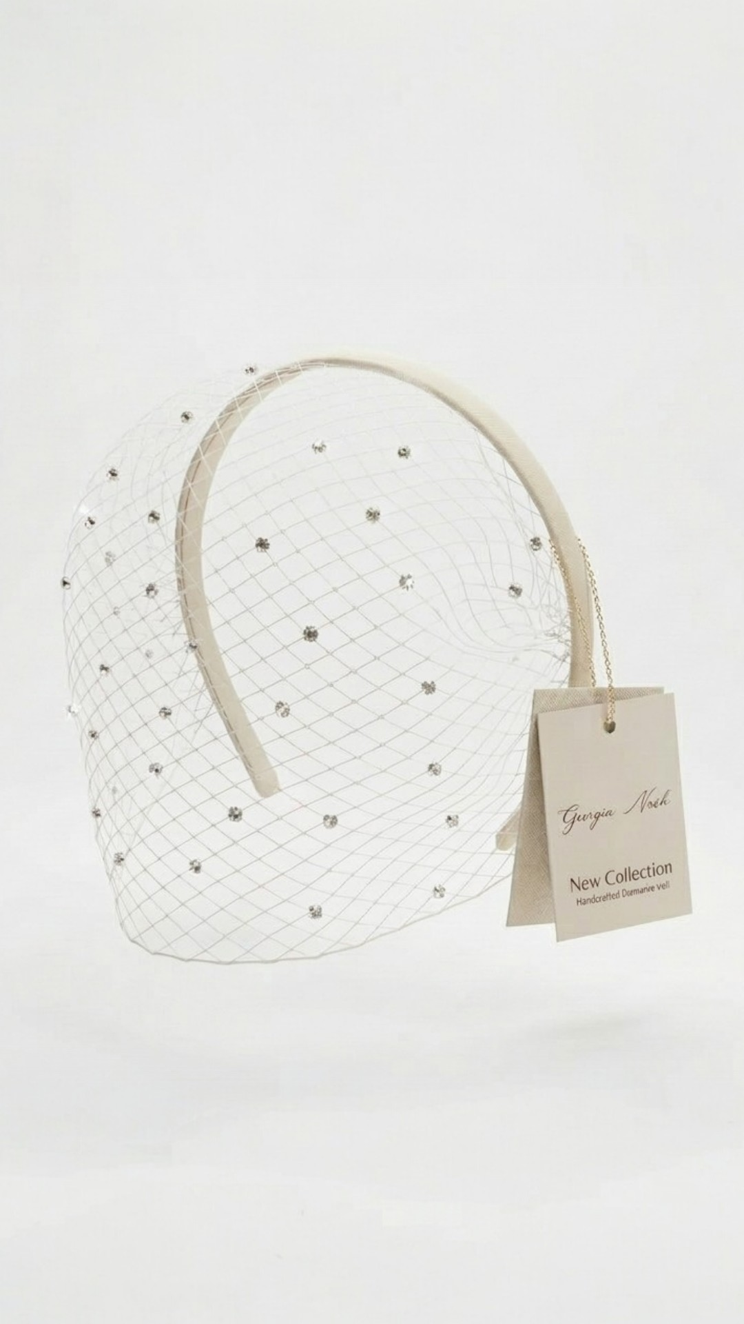 The [DIAMONTE EYE SHEILD] White diamanté veil headband